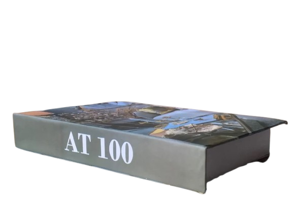 AT 100